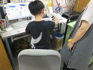 返却作業中の様子.jpg
